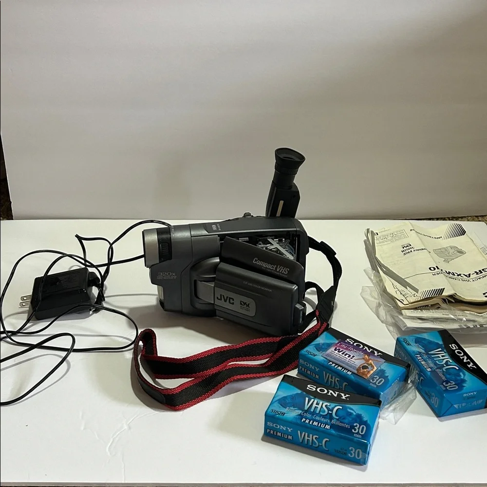 Compact VHS Camcorder in Gray with Red/Black Strap